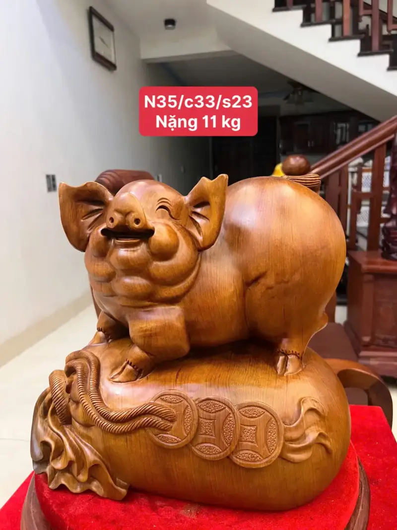 heo-nam-bao-tien-go-ngoc-am-G5093-1_1_Heo Nằm Bao Tiền Gỗ Ngọc Am Liền Khối Giá 3.200 Triệu Kích Thước Cao 33cm, Ngang 35cm, Sâu 23cm Tượng Heo Nằm Bao Tiền Gỗ Ngọc Am Liền Khối G5093